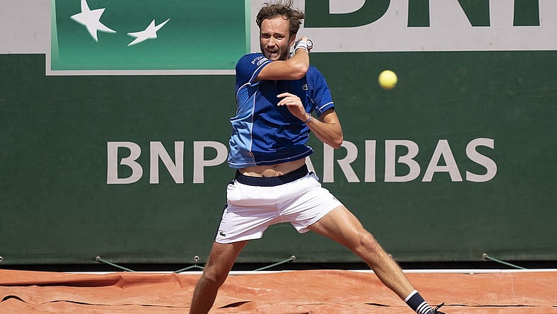 May 28, 2022; Paris, France; Daniil Medvedev returns a shot from Miomir Kecmanovic (SRB) during their match on day seven of the French Open at Stade Roland-Garros. Mandatory Credit: Susan Mullane-USA TODAY Sports