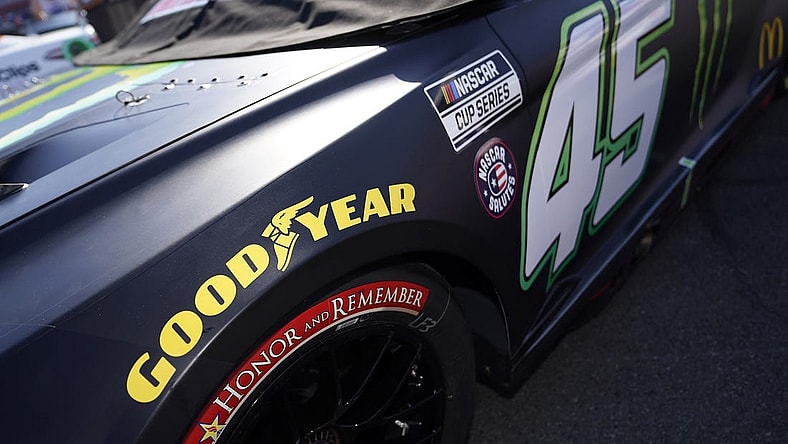 May 29, 2022; Concord, North Carolina, USA; A general view of the special Honor and Remember logo on the tire of the car of NASCAR Cup Series driver Kurt Busch (45) on pit road prior to the Coca-Cola 600 at Charlotte Motor Speedway. Mandatory Credit: Jasen Vinlove-USA TODAY Sports