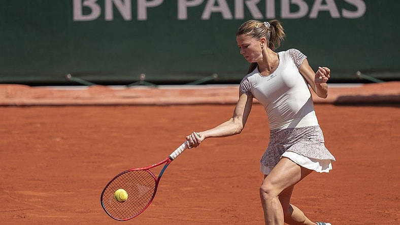 May 30, 2022; Paris, France; Camila Giorgi (ITA) returns a shot during her match against Daria Kasatkina on day nine of the French Open at Stade Roland-Garros. Mandatory Credit: Susan Mullane-USA TODAY Sports