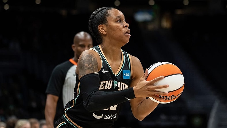 May 29, 2022; Seattle, Washington, USA; New York Liberty guard Asia Durr (25) shoots the ball against the Seattle Storm at Climate Pledge Arena. Mandatory Credit: Stephen Brashear-USA TODAY Sports