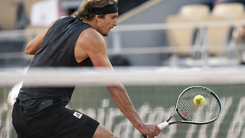 May 31, 2022; Paris, France; Alexander Zverev (GER) returns a shot during his match against Carlos Alcaraz (ESP) on day 10 of the French Open at Stade Roland-Garros. Mandatory Credit: Susan Mullane-USA TODAY Sports