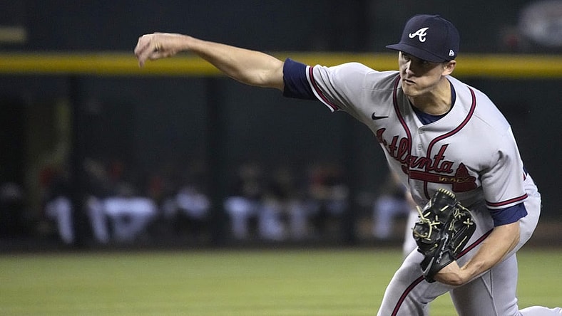 Jun 1, 2022; Phoenix, Arizona, USA; Atlanta Braves starting pitcher Kyle Wright (30) throws a pitch against the Arizona Diamondbacks in the first inning at Chase Field. Mandatory Credit: Rick Scuteri-USA TODAY Sports