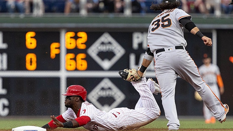 Jun 1, 2022; Philadelphia, Pennsylvania, USA; Philadelphia Phillies center fielder Odubel Herrera (37) steals second base past San Francisco Giants shortstop Brandon Crawford (35) during the fourth inning at Citizens Bank Park. Mandatory Credit: Bill Streicher-USA TODAY Sports
