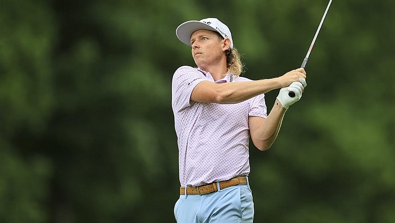 Jun 2, 2022; Dublin, Ohio, USA; Cameron Smith watches his shot from the ninth fairway during the first round of the Memorial Tournament. Mandatory Credit: Aaron Doster-USA TODAY Sports
