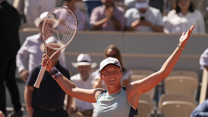 June 2, 2022; Paris, France; Iga Swiatek (POL) celebrates winning her semifinal match against Daria Kasatkina on day 12 of the French Open at Stade Roland-Garros. Mandatory Credit: Susan Mullane-USA TODAY Sports