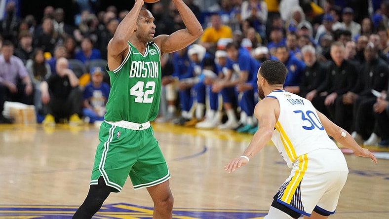 Jun 2, 2022; San Francisco, California, USA; Boston Celtics forward Al Horford (42) controls the ball while defended by Golden State Warriors guard Stephen Curry (30) during the third quarter in game one of the 2022 NBA Finals at Chase Center. Mandatory Credit: Kyle Terada-USA TODAY Sports