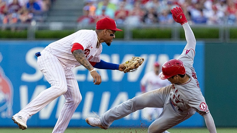 Jun 4, 2022; Philadelphia, Pennsylvania, USA; Los Angeles Angels starting pitcher Shohei Ohtani (17) is tagged out by Philadelphia Phillies shortstop Johan Camargo (7) while attempting to steal second base during the first inning at Citizens Bank Park. Mandatory Credit: Bill Streicher-USA TODAY Sports