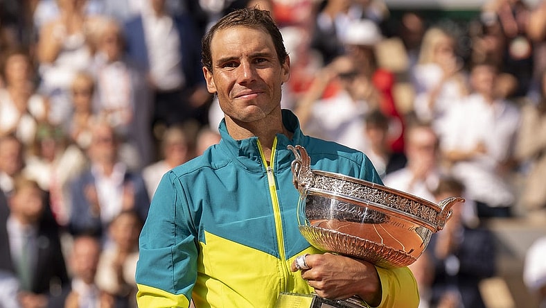 June 5, 2022; Paris, France; Rafael Nadal (ESP) poses with the trophy after winning  the men s singles final against Casper Ruud (NOR) on day 15 of the French Open at Stade Roland-Garros. Mandatory Credit: Susan Mullane-USA TODAY Sports