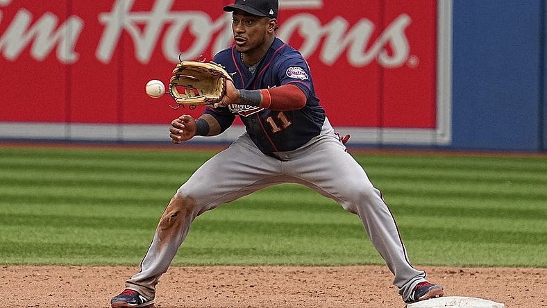 Jun 5, 2022; Toronto, Ontario, CAN; Minnesota Twins second baseman Jorge Polanco (11) makes a catch at second base to put out Toronto Blue Jays pinch runner Bradley Zimmer (not pictured) during the ninth inning at Rogers Centre. Mandatory Credit: John E. Sokolowski-USA TODAY Sports