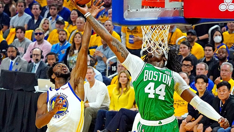 Jun 5, 2022; San Francisco, California, USA; Golden State Warriors forward Andrew Wiggins (22) and Boston Celtics center Robert Williams III (44) go for a rebound during game two of the 2022 NBA Finals at Chase Center. Mandatory Credit: Kyle Terada-USA TODAY Sports