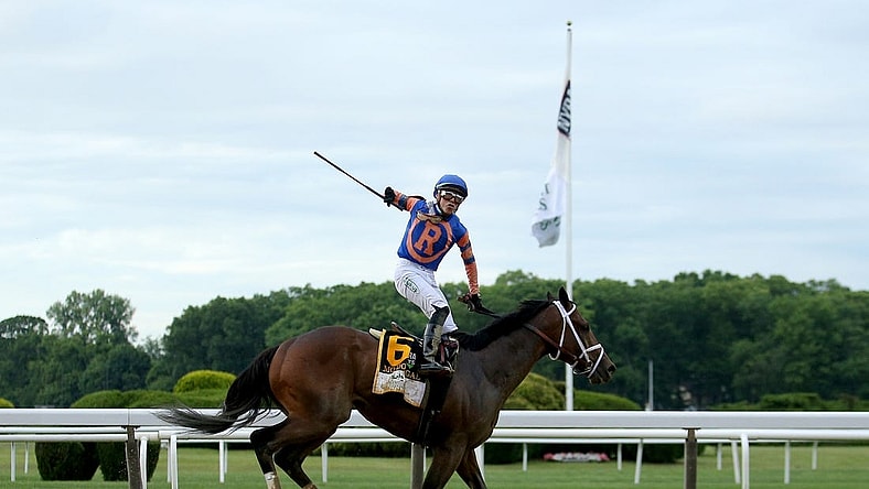 Jun 11, 2022; Elmont, NY, USA; Irad Ortiz, Jr. reacts after winning the Belmont Stakes atop Mo Donegal (6) in the Belmont Stakes, the eleventh race at Belmont Park Racetrack. Mandatory Credit: Brad Penner-USA TODAY Sports
