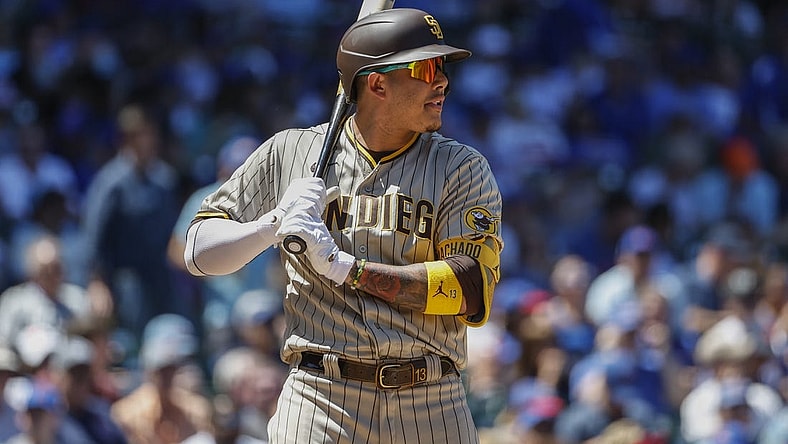 Jun 16, 2022; Chicago, Illinois, USA; San Diego Padres third baseman Manny Machado (13) bats against the Chicago Cubs during the second inning at Wrigley Field. Mandatory Credit: Kamil Krzaczynski-USA TODAY Sports