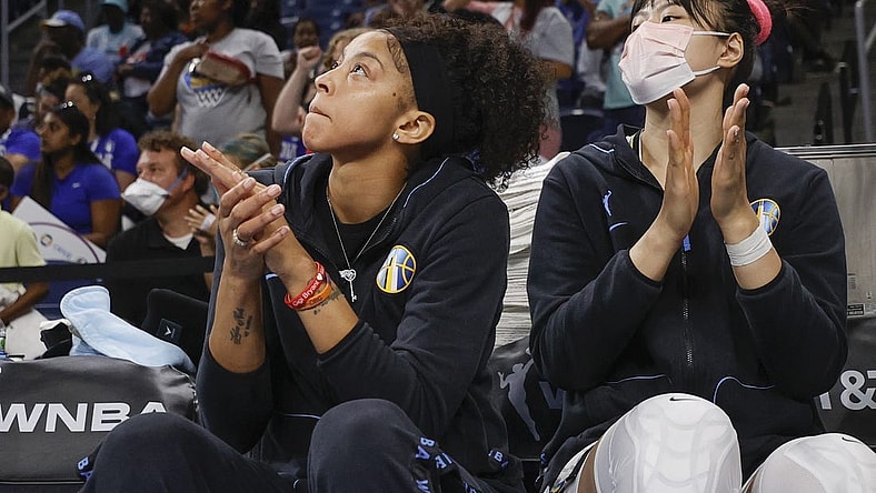 Jun 17, 2022; Chicago, Illinois, USA; Chicago Sky center Li Yueru (right) and forward Candace Parker (left) applaud their team during overtime of a WNBA game against the Atlanta Dream at Wintrust Arena. Mandatory Credit: Kamil Krzaczynski-USA TODAY Sports