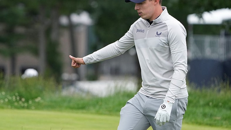 Jun 19, 2022; Brookline, Massachusetts, USA; Matt Fitzpatrick acknowledges the crowd during the final round of the U.S. Open golf tournament. Mandatory Credit: John David Mercer-USA TODAY Sports
