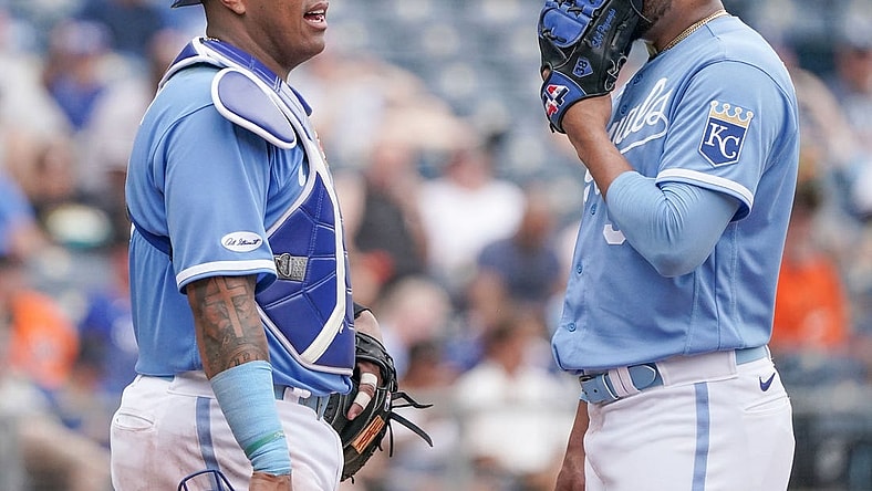 Jun 12, 2022; Kansas City, Missouri, USA; Kansas City Royals catcher Salvador Perez (13) talks with relief pitcher Joel Payamps (38) against the Baltimore Orioles during the game at Kauffman Stadium. Mandatory Credit: Denny Medley-USA TODAY Sports