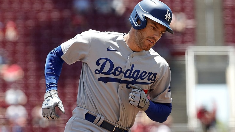 Jun 23, 2022; Cincinnati, Ohio, USA; Los Angeles Dodgers first baseman Freddie Freeman (5) runs the bases after hitting a two-run home run against the Cincinnati Reds during the third inning at Great American Ball Park. Mandatory Credit: David Kohl-USA TODAY Sports