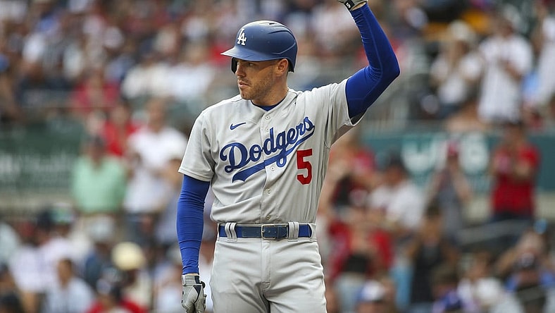 Jun 25, 2022; Atlanta, Georgia, USA; Los Angeles Dodgers first baseman Freddie Freeman (5) acknowledges the crowd before an at bat against the Atlanta Braves in the first inning at Truist Park. Mandatory Credit: Brett Davis-USA TODAY Sports