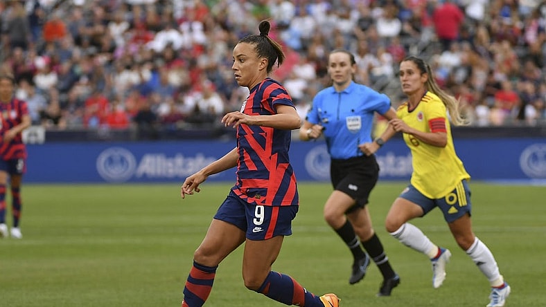 Jun 25, 2022; Commerce City, Colorado, USA; USA forward Mallory Pugh (9) brings the ball up field against Colombia during an international friendly soccer match at Dick's Sporting Goods Park. Mandatory Credit: John Leyba-USA TODAY Sports