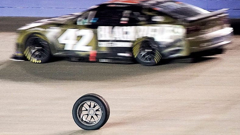 A tire that came off of NASCAR Cup Series driver Chris Buescher (17) rolls down the track during the Ally 400 at the Nashville Superspeedway in Lebanon, Tenn., Sunday, June 26, 2022.

Nascar 062622 An 048