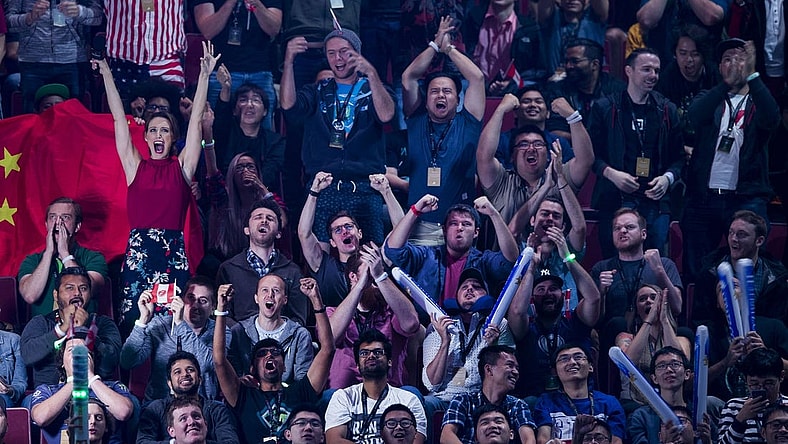 Aug 25, 2018; Vancouver, British Columbia, CAN; Fans watch as Team Evil Geniuses  plays Team LGD in the lower bracket final of the International Dota 2 Championships at Rogers Arena in Vancouver.  The championships are eSports largest annual tournament with approximately $25 million U.S. in prize money to be awarded.  Dota 2 is a free 10-player online video game with two teams of players from all over the world competing against one another in each game. Mandatory Credit: Bob Frid-USA TODAY Sports