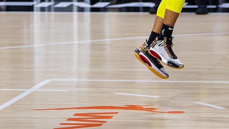 Oct 2, 2020; Bradenton, Florida, USA; The shoes of Seattle Storm guard Jordin Canada (21) with the WNBA logo during game 1 of the WNBA finals against the Las Vegas Aces at IMG Academy. Mandatory Credit: Mary Holt-USA TODAY Sports