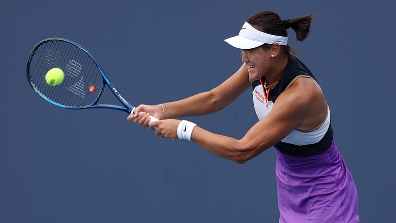 Mar 24, 2021; Miami, Florida, USA; Xiyu Wang of China hits a backhand against Jelena Ostapenko of Latvia (not pictured) in the first round of the Miami Open at Hard Rock Stadium. Mandatory Credit: Geoff Burke-USA TODAY Sports