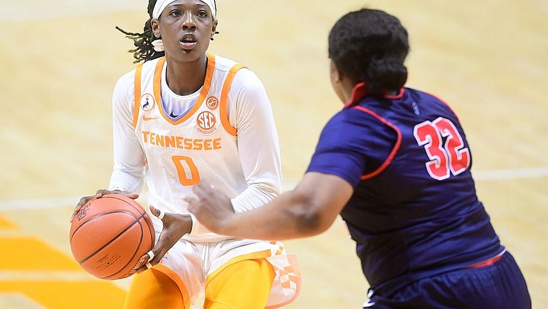 Tennessee guard/forward Rennia Davis (0) looks at the basket while defended by Ole Miss forward Iyanla Kitchens (32) during a basketball game between the Tennessee Lady Vols and the Ole Miss Rebels at Thompson-Boling Arena in Knoxville, Tenn., on Thursday, January 28, 2021.

Syndication The Knoxville News Sentinel