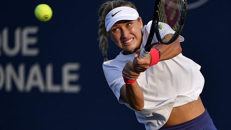 Aug 9, 2021; Montreal, Quebec, Canada; Anastasia Potapova of Russia hits a shot against Shelby Rogers of the United States (not pictured) during first round play at Stade IGA. Mandatory Credit: Eric Bolte-USA TODAY Sports