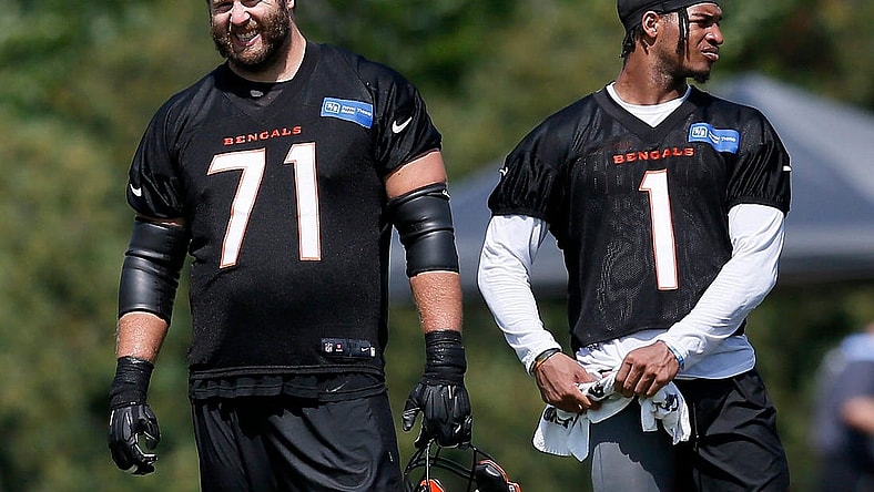 Cincinnati Bengals offensive tackle Riley Reiff (71) watches from the sideline between sessions during a training camp practice at the Paul Brown Stadium practice facility in downtown Cincinnati on Thursday, Aug. 12, 2021. Air temperatures reached the upper 90s Thursday, with "real feel" rising above 110 in the afternoon.

Cincinnati Bengals Training Camp