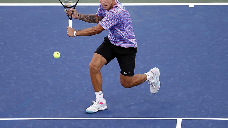 Sep 3, 2021; Flushing, NY, USA; Alex Molcan of Slovakia hits a shot against Diego Schwartzman of Argentina in a third round match on day five of the 2021 U.S. Open tennis tournament at USTA Billie Jean King National Tennis Center. Mandatory Credit: Jerry Lai-USA TODAY Sports