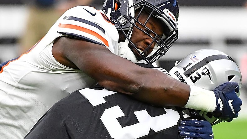 Oct 10, 2021; Paradise, Nevada, USA; Chicago Bears inside linebacker Roquan Smith (58) tackles Las Vegas Raiders wide receiver Hunter Renfrow (13) during a game at Allegiant Stadium. Mandatory Credit: Stephen R. Sylvanie-USA TODAY Sports