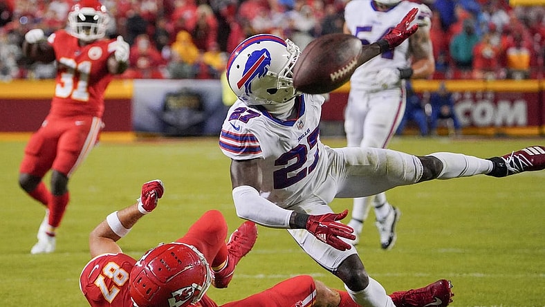 Oct 10, 2021; Kansas City, Missouri, USA; Buffalo Bills cornerback Tre'Davious White (27) breaks up a pass intended for Kansas City Chiefs tight end Travis Kelce (87) during the second half at GEHA Field at Arrowhead Stadium. Mandatory Credit: Denny Medley-USA TODAY Sports