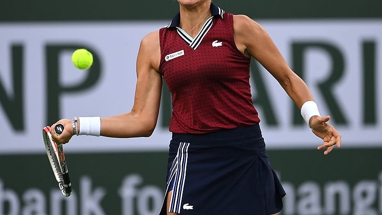 Oct 14, 2021; Indian Wells, CA, USA; Anett Kontaveit (EST) hits a shot against Ons Jabeur (TUN) in their quarterfinal match during the BNP Paribas Open at the Indian Wells Tennis Garden. Mandatory Credit: Jayne Kamin-Oncea-USA TODAY Sports