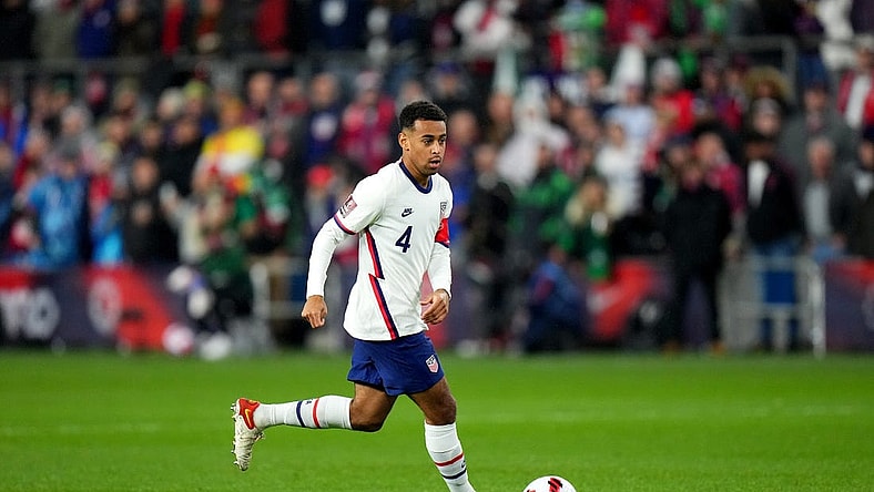 Tyler Adams #4 of the United States maintains possession during the first half of a 2022 World Cup CONCACAF qualifying match against Mexico, Friday, Nov. 12, 2021, at TQL Stadium in Cincinnati. United States won against Mexico, 2-0.

Mexico At Usa 2022 World Cup Qualifier Nov 11
