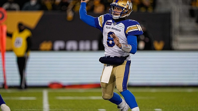 Dec 12, 2021; Hamilton, Ontario, CAN; Winnipeg Blue Bombers quarterback Zach Collaros (8) throws a pass against the Hamilton Tiger-Cats during the 108th Grey Cup football game at Tim Hortons Field. Mandatory Credit: John E. Sokolowski-USA TODAY Sports