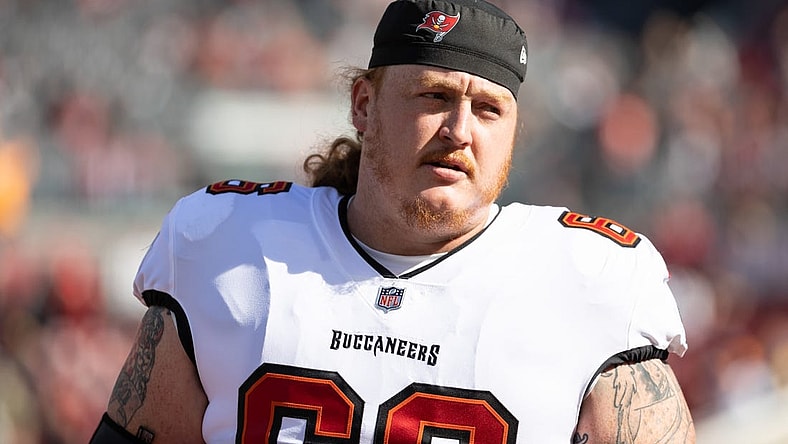 Jan 23, 2022; Tampa, Florida, USA; Tampa Bay Buccaneers center Ryan Jensen (66) warms up before the game against the Los Angeles Rams during a NFC Divisional playoff football game at Raymond James Stadium. Mandatory Credit: Matt Pendleton-USA TODAY Sports