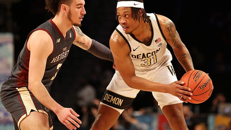 Mar 9, 2022; Brooklyn, NY, USA; Wake Forest Demon Deacons guard Alondes Williams (31) controls the ball against Boston College Eagles guard Jaeden Zackery (3) during the first half at Barclays Center. Mandatory Credit: Brad Penner-USA TODAY Sports