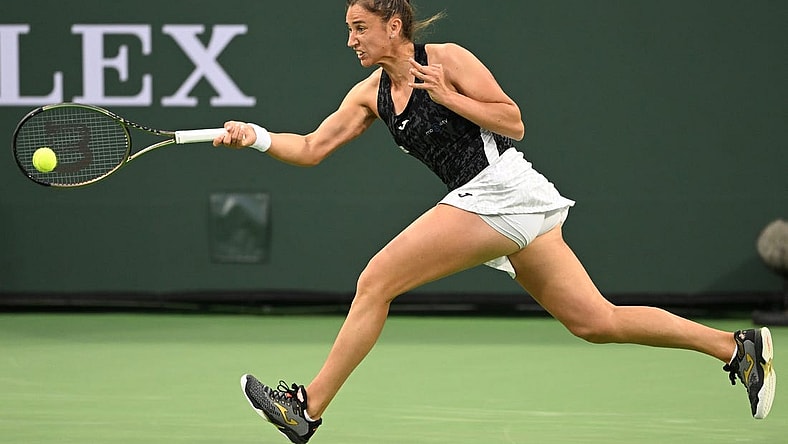 Mar 14, 2022; Indian Wells, CA, USA; Sara Sorribes Tormo (ESP) hits a shot in her third round match against Paula Badosa (not pictured) during the BNP Paribas Open at the Indian Wells Tennis Garden. Mandatory Credit: Jayne Kamin-Oncea-USA TODAY Sports