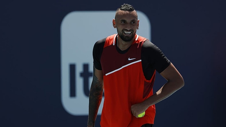 Mar 29, 2022; Miami Gardens, FL, USA; Nick Kyrgios (AUS) smiles between points against Jannik Sinner (ITA)(not pictured) in a fourth round men's singles match in the Miami Open at Hard Rock Stadium. Mandatory Credit: Geoff Burke-USA TODAY Sports