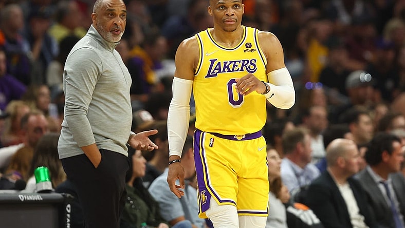 Apr 5, 2022; Phoenix, Arizona, USA; Los Angeles Lakers guard Russell Westbrook and assistant coach Phil Handy against the Phoenix Suns at Footprint Center. Mandatory Credit: Mark J. Rebilas-USA TODAY Sports