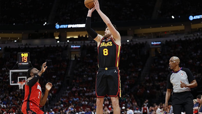 Apr 10, 2022; Houston, Texas, USA; Atlanta Hawks forward Danilo Gallinari (8) shoots the ball as Houston Rockets forward David Nwaba (2) defends during the fourth quarter at Toyota Center. Mandatory Credit: Troy Taormina-USA TODAY Sports