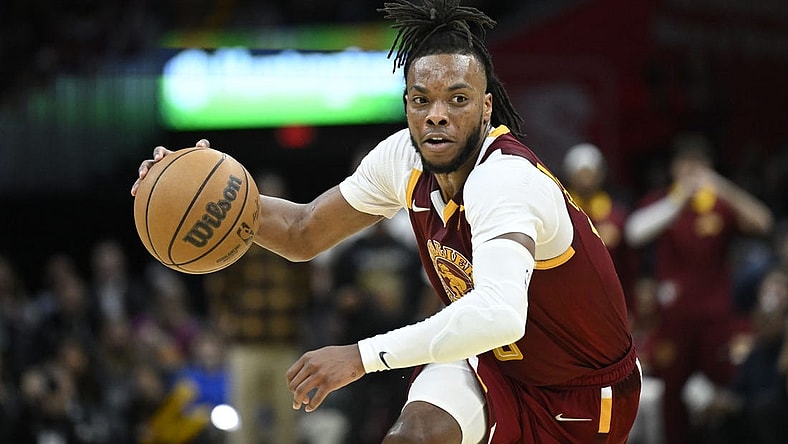 Apr 15, 2022; Cleveland, Ohio, USA; Cleveland Cavaliers guard Darius Garland (10) dribbles the ball in the third quarter against the Atlanta Hawks at Rocket Mortgage FieldHouse. Mandatory Credit: David Richard-USA TODAY Sports
