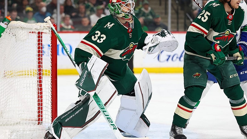 Apr 21, 2022; Saint Paul, Minnesota, USA; Minnesota Wild goaltender Cam Talbot (33) defends during the first period against the Vancouver Canucks at Xcel Energy Center. Mandatory Credit: Matt Krohn-USA TODAY Sports