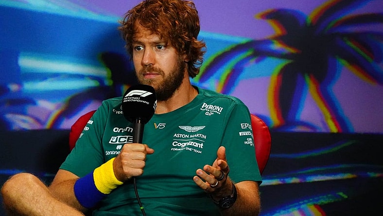 May 6, 2022; Miami Gardens, Florida, USA; Aston Martin driver Sebastian Vettel of Germany talks with the media during a press conference before their practice session for the Miami Grand Prix at Miami International Autodrome. Mandatory Credit: John David Mercer-USA TODAY Sports