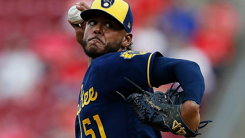 Milwaukee Brewers starting pitcher Freddy Peralta (51) throws a pitch in the first inning of the MLB National League game between the Cincinnati Reds and the Milwaukee Brewers at Great American Ball Park in downtown Cincinnati on Tuesday, May 10, 2022. The Reds led 1-0 after three innings.

Milwaukee Brewers At Cincinnati Reds