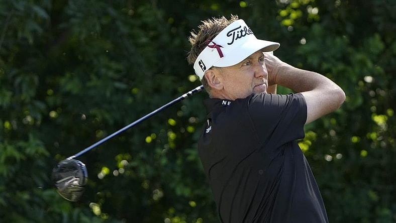 May 26, 2022; Fort Worth, Texas, USA; Ian Poulter plays his shot from the sixth tee during the first round of the Charles Schwab Challenge golf tournament. Mandatory Credit: Jim Cowsert-USA TODAY Sports