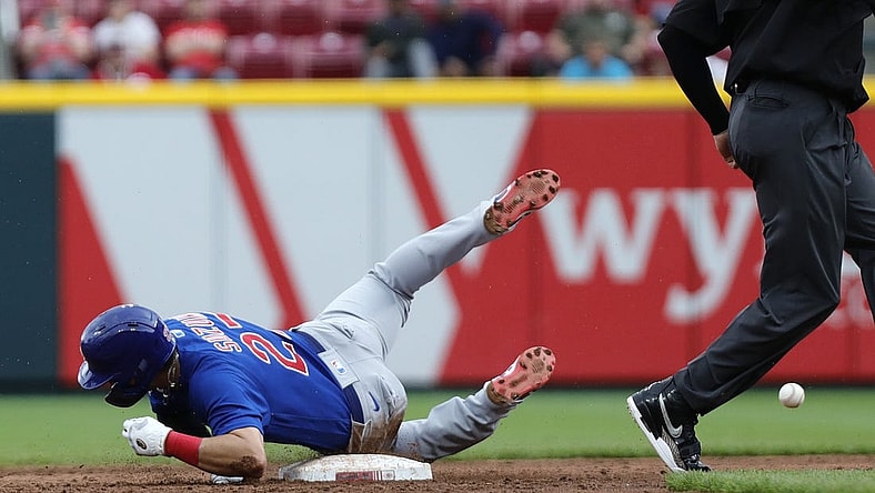 May 26, 2022; Cincinnati, Ohio, USA; Chicago Cubs right fielder Seiya Suzuki (27) slides safely after stealing second base against the Cincinnati Reds during the third inning at Great American Ball Park. Mandatory Credit: David Kohl-USA TODAY Sports