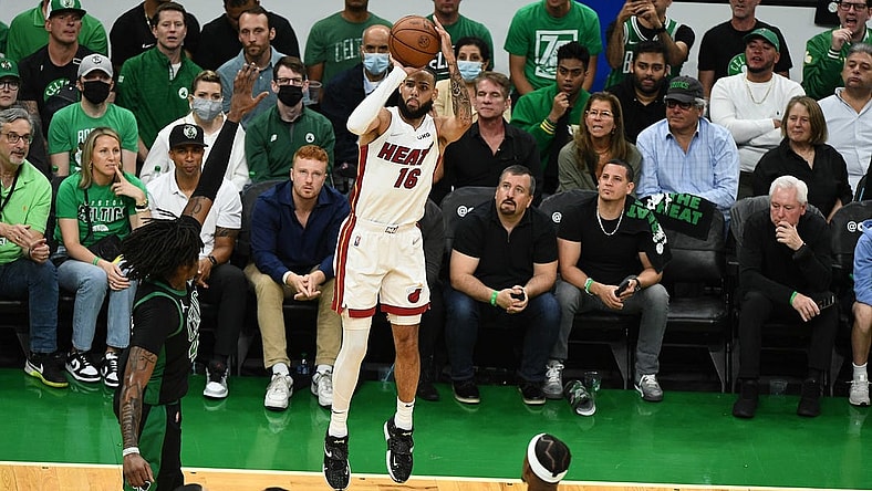 May 27, 2022; Boston, Massachusetts, USA; Miami Heat forward Caleb Martin (16) shoots against the Boston Celtics during the first half in game six of the 2022 eastern conference finals at TD Garden. Mandatory Credit: Brian Fluharty-USA TODAY Sports