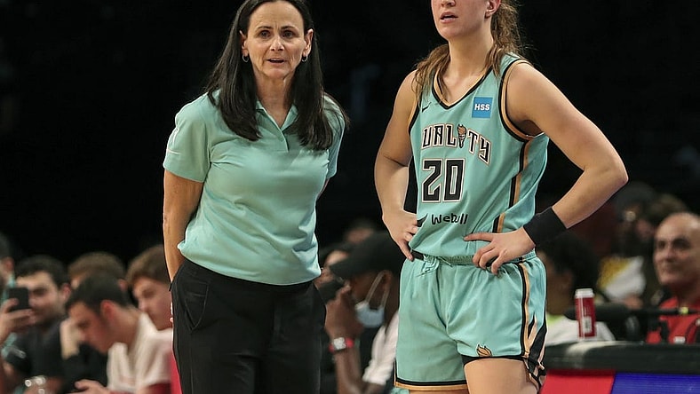 Jun 1, 2022; Brooklyn, New York, USA; New York Liberty head coach Sandy Brondello and guard Sabrina Ionescu (20) talk prior to a substitution in the first quarter against the Indiana Fever at Barclays Center. Mandatory Credit: Wendell Cruz-USA TODAY Sports