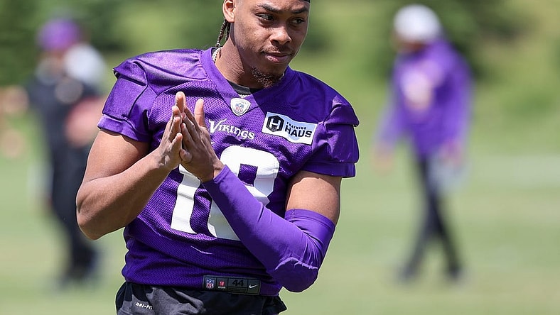Jun 8, 2022; Minneapolis, Minnesota, USA; Minnesota Vikings wide receiver Justin Jefferson (18) looks on during mandatory mini camp at TCO Performance Center. Mandatory Credit: Matt Krohn-USA TODAY Sports